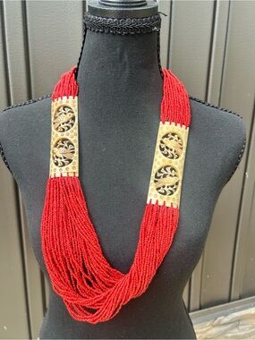 Red Multi-Strand Beaded Necklace with Gold Carved Panels